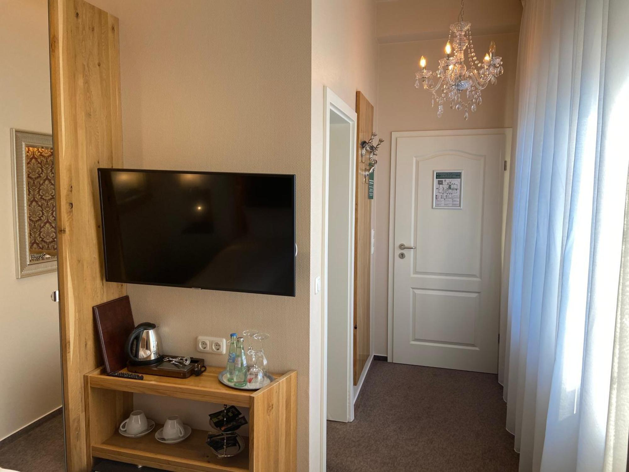 ペーターゼンス ラントハウス ホテル シャルボイツ 部屋 写真